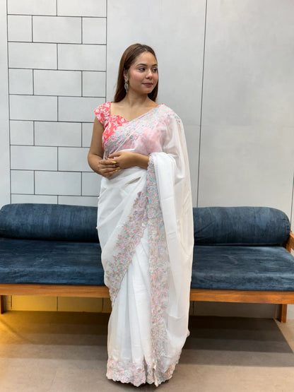 Elegant White tabby Organza Saree with Pastel Floral Embroidery & Pink Printed Blouse