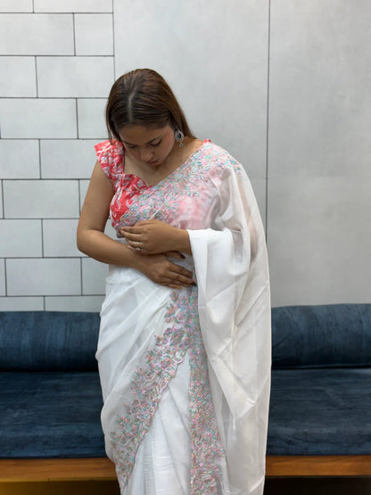 Elegant White tabby Organza Saree with Pastel Floral Embroidery & Pink Printed Blouse