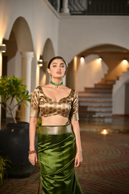 Timeless Royal Grace in Emerald Green Saree with Golden Heritage Elegance