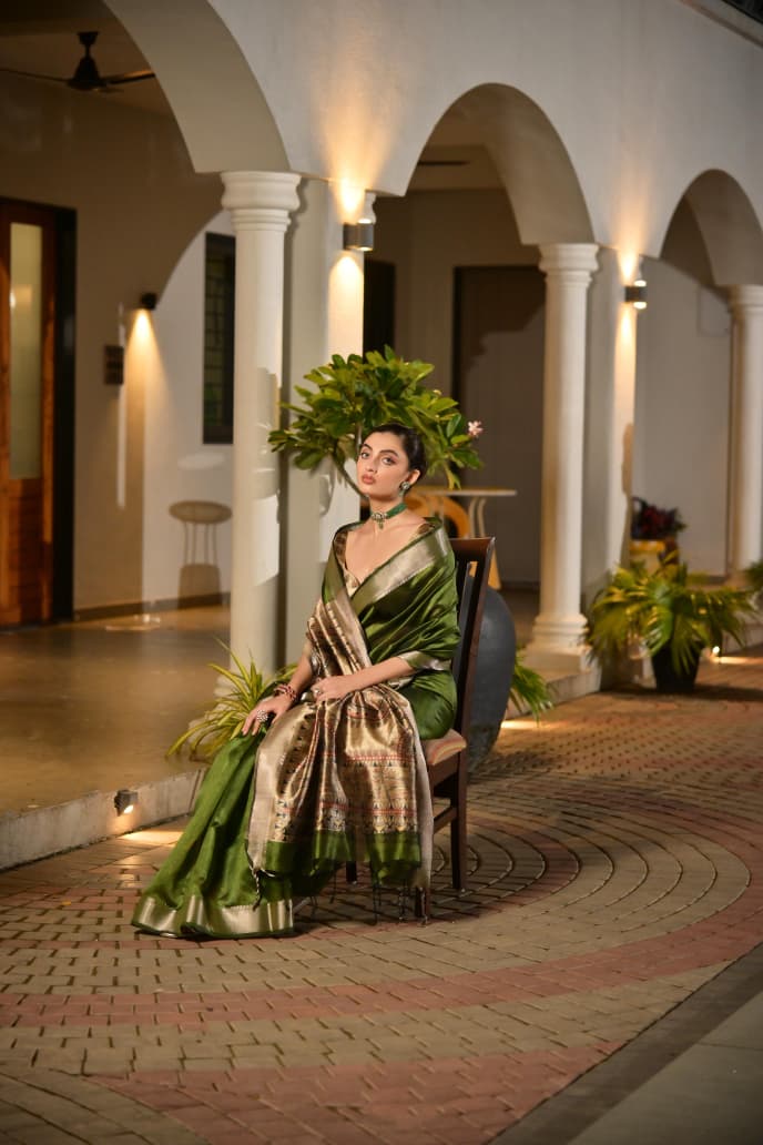 Timeless Royal Grace in Emerald Green Saree with Golden Heritage Elegance