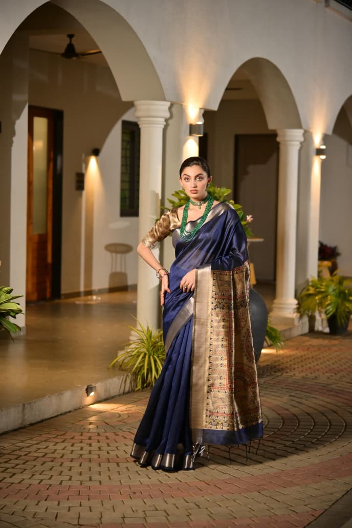 Timeless Royal Grace in Emerald Green Saree with Golden Heritage Elegance