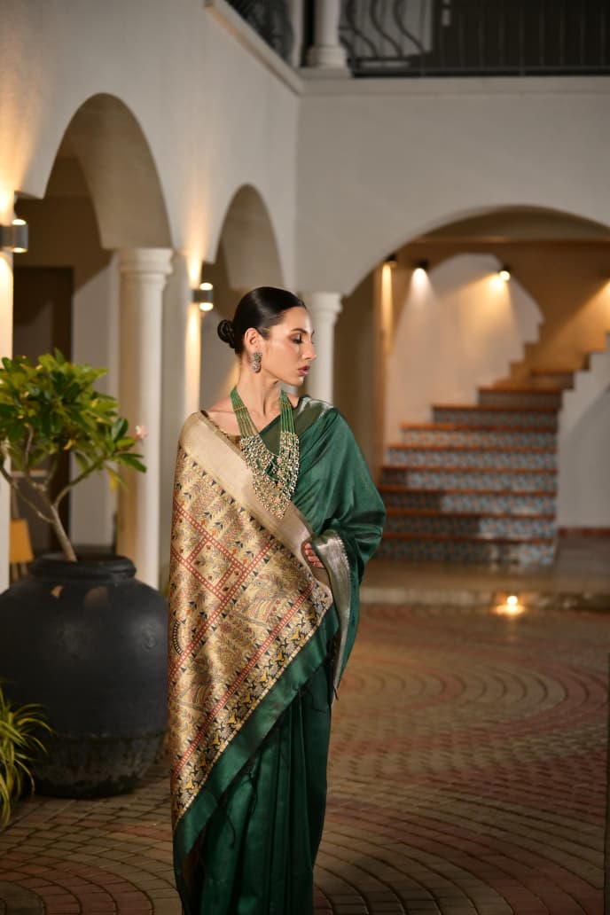 Timeless Royal Grace in Emerald Green Saree with Golden Heritage Elegance
