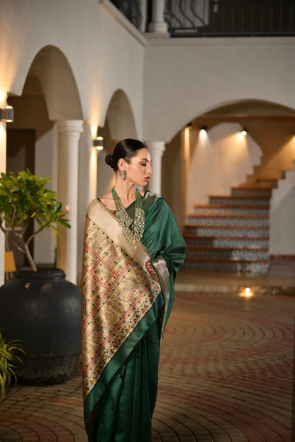 Timeless Royal Grace in Emerald Green Saree with Golden Heritage Elegance