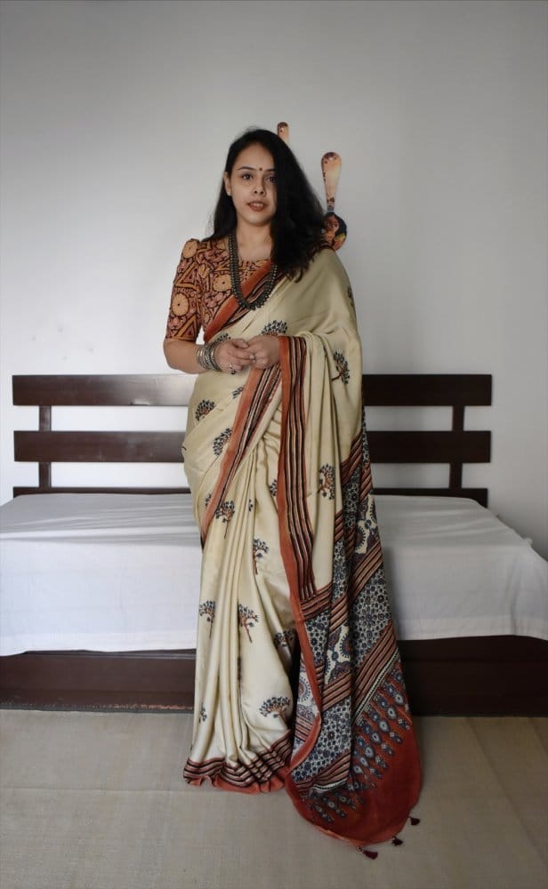 Over Zari Strips Peacock Pallu Saree with Beautiful Peacocks Border