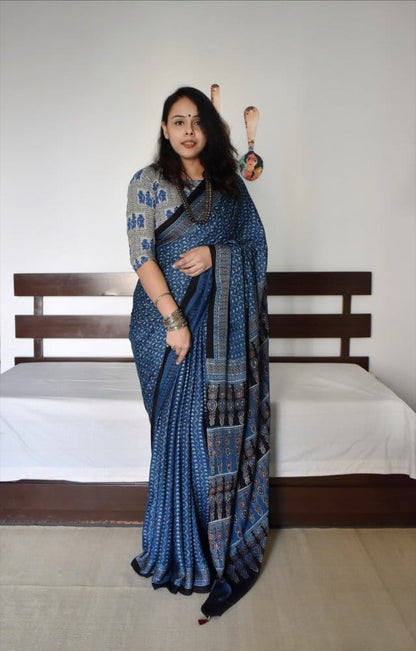 Over Zari Strips Peacock Pallu Saree with Beautiful Peacocks Border